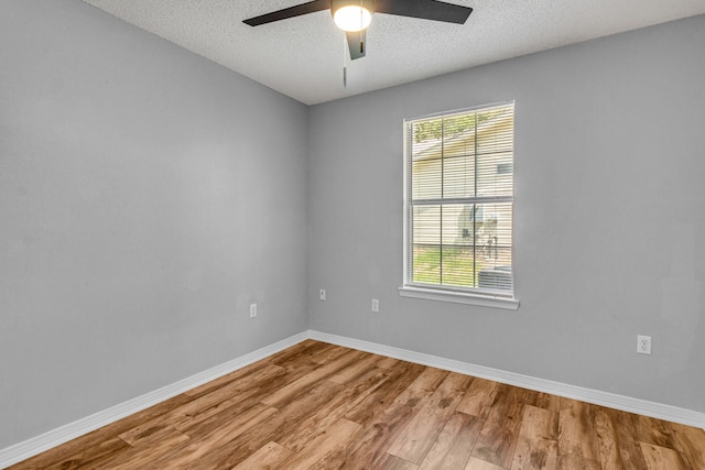 960 Valley Rd, Crestview, FL 32539 - empty room with a textured ceiling, ceiling fan, baseboards, and light wood-style floors