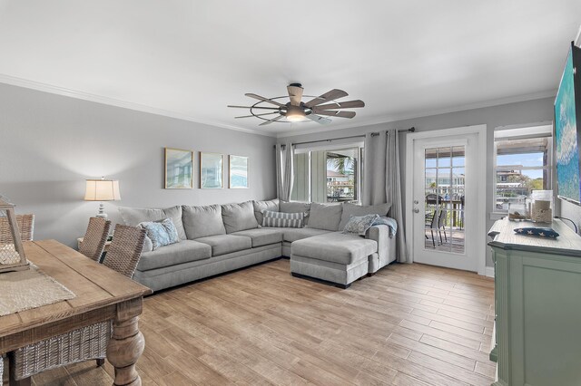 169 Durango Rd, Destin, FL 32541 - living room with crown molding, ceiling fan, and a wealth of natural light