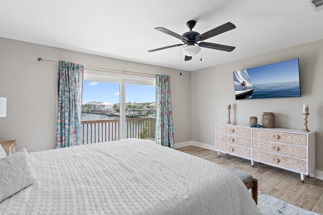 169 Durango Rd, Destin, FL 32541 - bedroom with baseboards, ceiling fan, wood finished floors, and visible vents