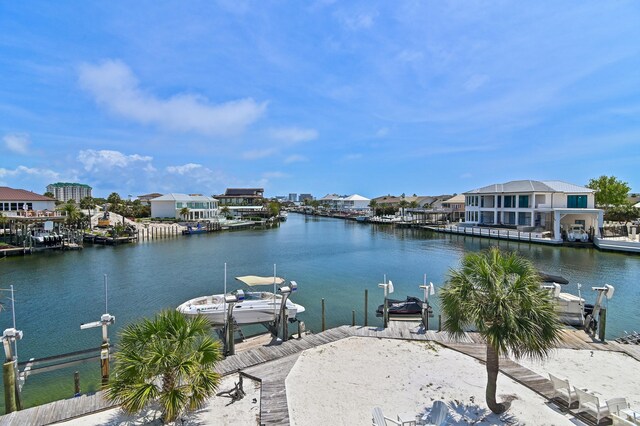 169 Durango Rd, Destin, FL 32541 - view of dock with a residential view, boat lift, and a water view