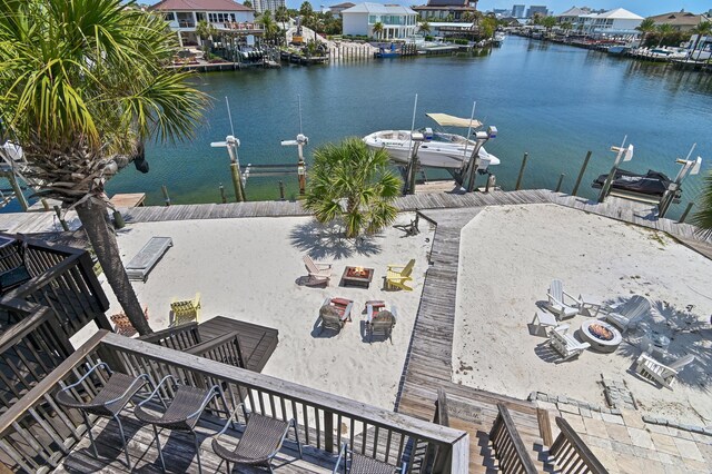 169 Durango Rd, Destin, FL 32541 - view of dock featuring a water view, an outdoor fire pit, and boat lift