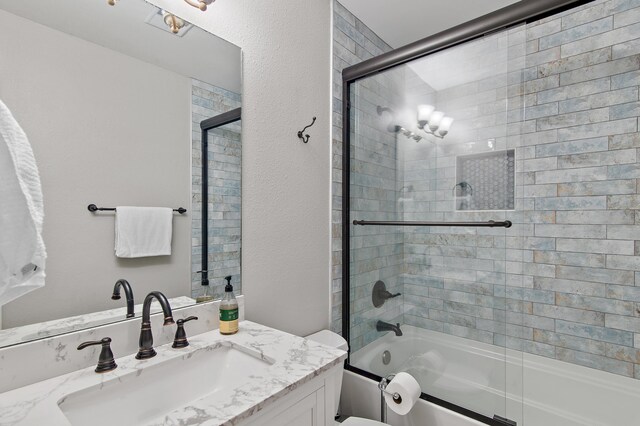 169 Durango Rd, Destin, FL 32541 - bathroom with vanity, enclosed tub / shower combo, and toilet