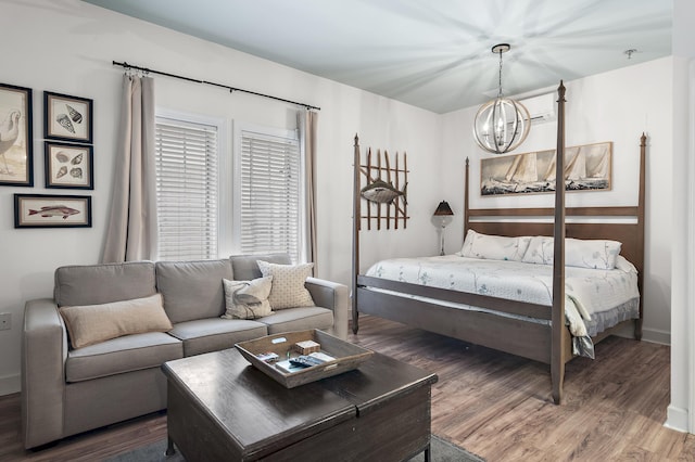 10343 E County Highway 30a Unit B233, Rosemary Beach, FL 32461 - bedroom featuring a notable chandelier and wood finished floors