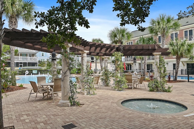 10343 E County Highway 30a Unit B233, Rosemary Beach, FL 32461 - view of patio / terrace with a community pool, fence, a pergola, and a community hot tub