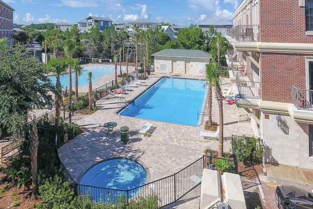 10343 E County Highway 30a Unit B233, Rosemary Beach, FL 32461 - community pool featuring a patio area and fence