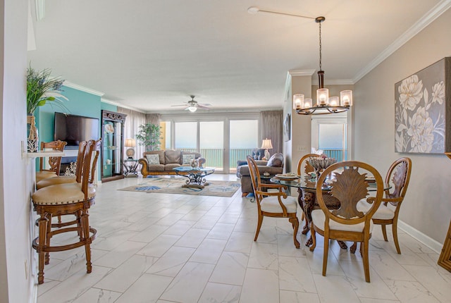 8601 Surf Dr Unit 14E, Panama City Beach, FL 32408 - dining room with crown molding, marble finish floor, ceiling fan with notable chandelier, and baseboards