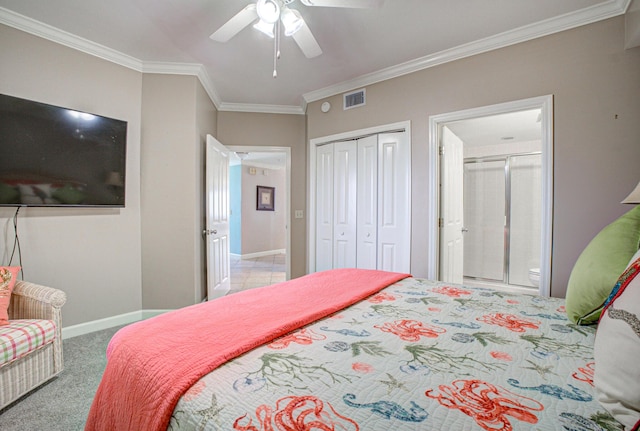 8601 Surf Dr Unit 14E, Panama City Beach, FL 32408 - bedroom with ceiling fan, visible vents, crown molding, a closet, and carpet flooring