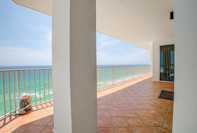8601 Surf Dr Unit 14E, Panama City Beach, FL 32408 - balcony featuring a beach view and a water view