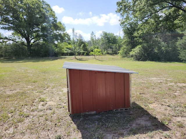 258 Briar Rd, Defuniak Springs, FL 32433 - view of outbuilding with view of scattered trees