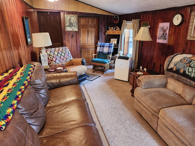 258 Briar Rd, Defuniak Springs, FL 32433 - living area featuring wood walls, carpet flooring, and vaulted ceiling