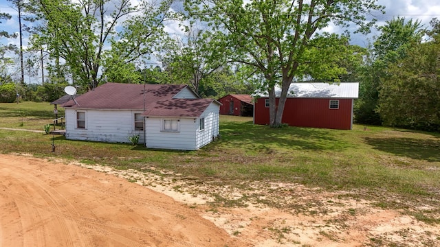 258 Briar Rd, Defuniak Springs, FL 32433 - view of outbuilding featuring an outbuilding and view of scattered trees