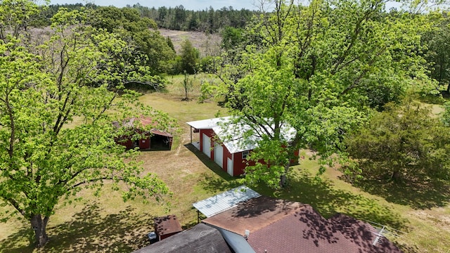 258 Briar Rd, Defuniak Springs, FL 32433 - aerial view of property and surrounding area featuring a heavily wooded area