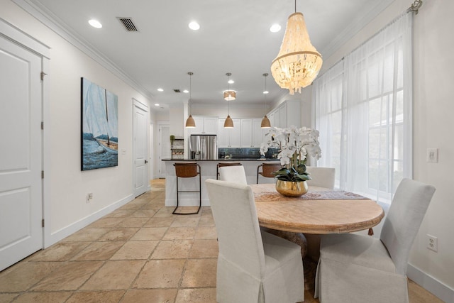 132 Carson Oaks Ln, Santa Rosa Beach, FL 32459 - dining space featuring baseboards, ornamental molding, stone tile floors, and recessed lighting