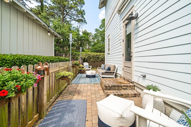 132 Carson Oaks Ln, Santa Rosa Beach, FL 32459 - view of patio featuring an outdoor hangout area and fence