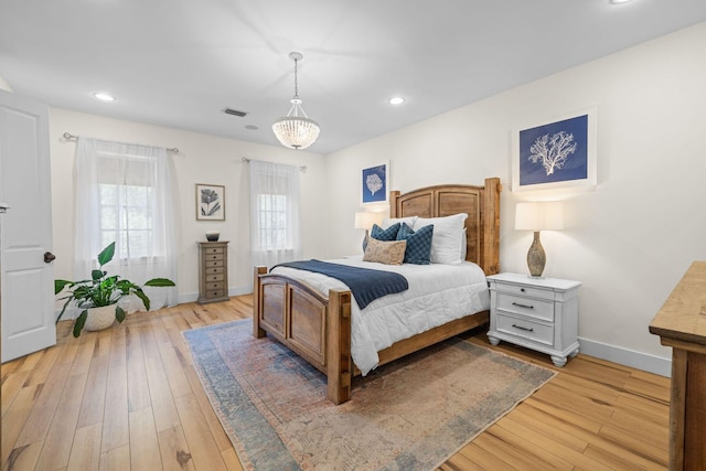132 Carson Oaks Ln, Santa Rosa Beach, FL 32459 - bedroom featuring baseboards, recessed lighting, light wood-style floors, and visible vents