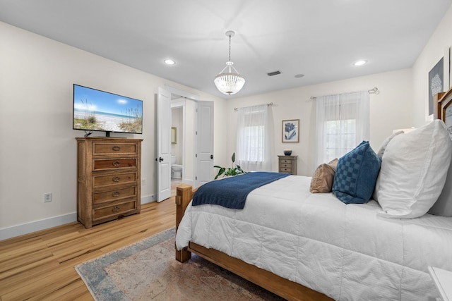 132 Carson Oaks Ln, Santa Rosa Beach, FL 32459 - bedroom featuring visible vents, baseboards, light wood finished floors, ensuite bathroom, and recessed lighting