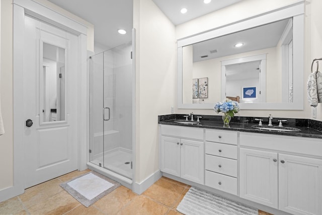 132 Carson Oaks Ln, Santa Rosa Beach, FL 32459 - full bathroom with double vanity, a sink, and a shower stall
