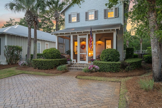 132 Carson Oaks Ln, Santa Rosa Beach, FL 32459 - traditional-style house featuring a porch