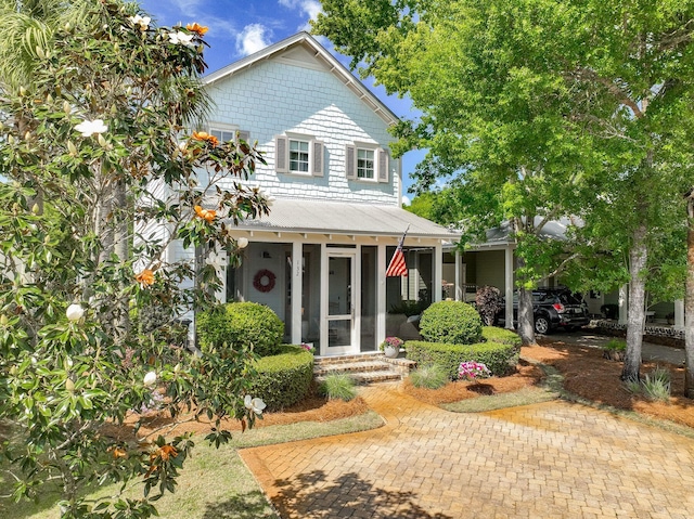 132 Carson Oaks Ln, Santa Rosa Beach, FL 32459 - view of front of property featuring a sunroom and entry steps