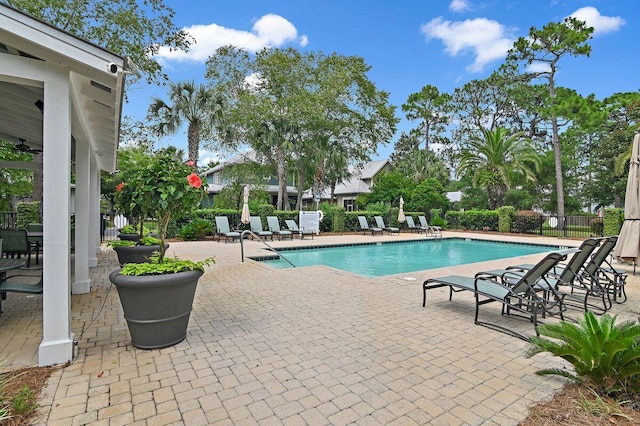132 Carson Oaks Ln, Santa Rosa Beach, FL 32459 - community pool with a patio area and fence
