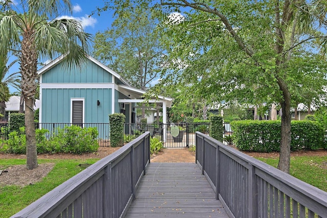 132 Carson Oaks Ln, Santa Rosa Beach, FL 32459 - back of property with fence private yard, a gate, and board and batten siding
