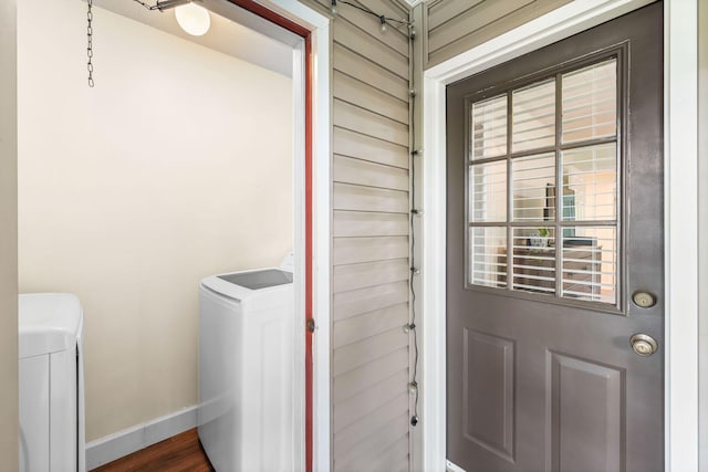 229 Carmel Dr Unit 4, Fort Walton Beach, FL 32547 - view of exterior entry with washing machine and dryer and stucco siding