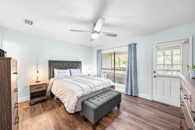 229 Carmel Dr Unit 4, Fort Walton Beach, FL 32547 - bedroom with wood finished floors, multiple windows, and baseboards