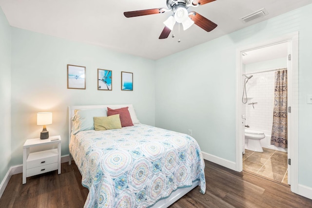 229 Carmel Dr Unit 4, Fort Walton Beach, FL 32547 - bedroom featuring wood finished floors, baseboards, ensuite bath, and a ceiling fan