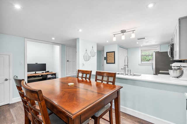 229 Carmel Dr Unit 4, Fort Walton Beach, FL 32547 - dining area featuring wood finished floors and recessed lighting