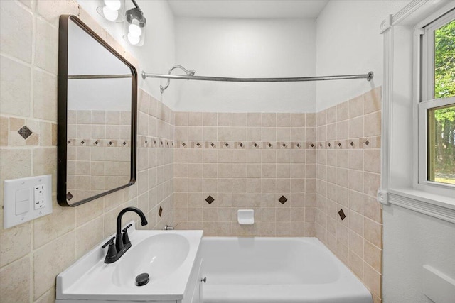 full bathroom with a sink and shower / bathtub combination
