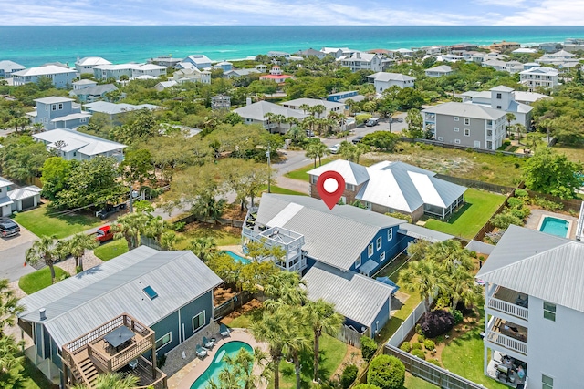aerial view with a water view and a residential view