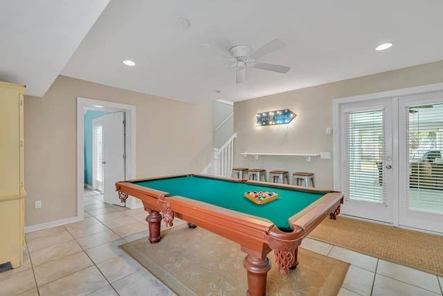 recreation room with a ceiling fan, billiards, and light tile patterned flooring