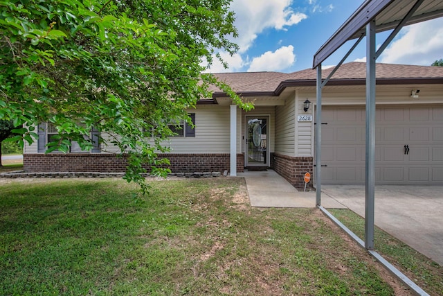 2628 Salamanca St, Navarre, FL 32566 - ranch-style home with an attached garage, concrete driveway, brick siding, and a front yard