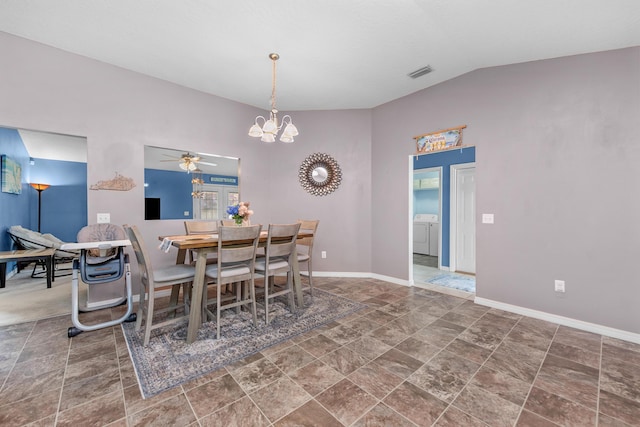 2628 Salamanca St, Navarre, FL 32566 - dining space with stone finish flooring, independent washer and dryer, visible vents, baseboards, and lofted ceiling