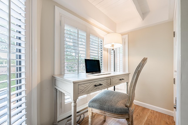 office area featuring light wood-style floors and baseboards