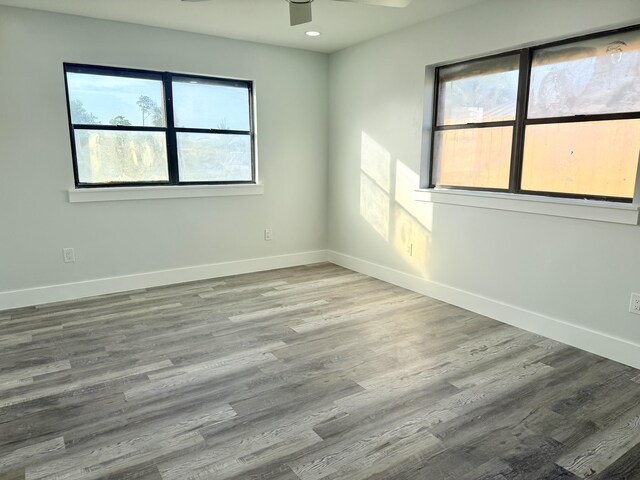 2710 Rutgers Dr, Panama City, FL 32405 - unfurnished room with ceiling fan, baseboards, and wood finished floors