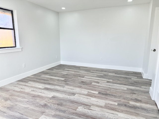2710 Rutgers Dr, Panama City, FL 32405 - spare room featuring baseboards, recessed lighting, and wood finished floors