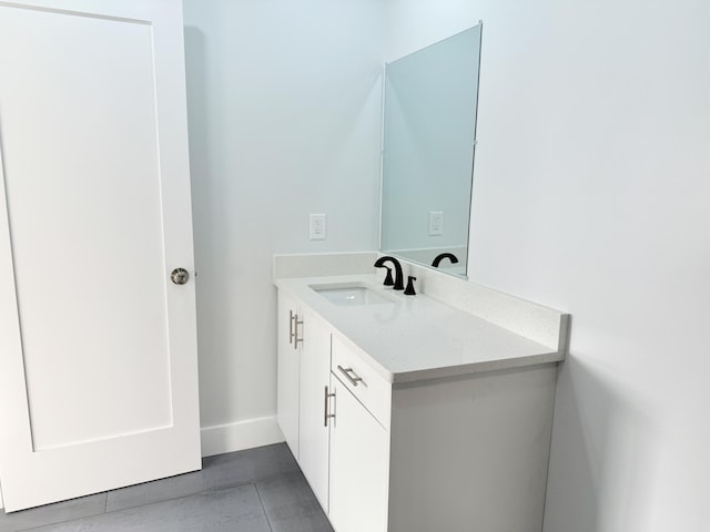 2710 Rutgers Dr, Panama City, FL 32405 - bathroom featuring tile patterned flooring, baseboards, and vanity