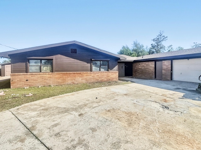 2710 Rutgers Dr, Panama City, FL 32405 - single story home with a garage, brick siding, and driveway