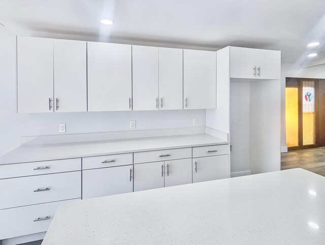 2710 Rutgers Dr, Panama City, FL 32405 - kitchen featuring white cabinets and recessed lighting