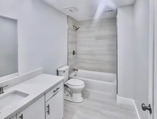 2710 Rutgers Dr, Panama City, FL 32405 - bathroom featuring toilet, baseboards, visible vents, vanity, and shower / bathing tub combination