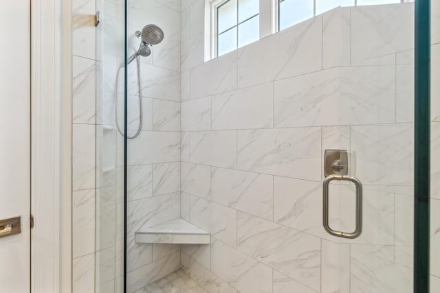 full bathroom with a shower stall
