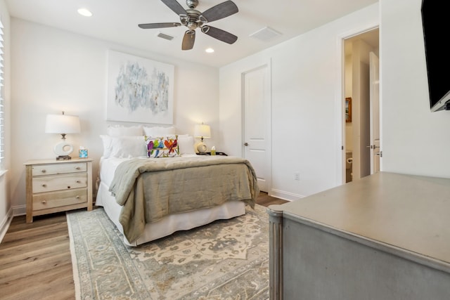 bedroom featuring recessed lighting, baseboards, light wood-type flooring, and visible vents