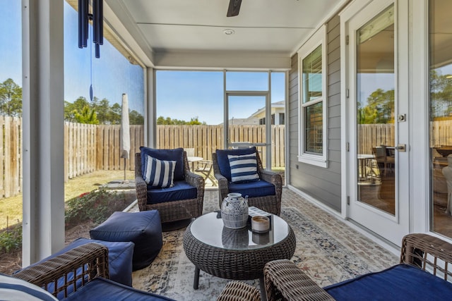 sunroom / solarium with french doors and a healthy amount of sunlight