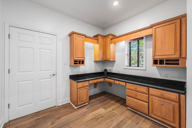 2928 Pine Valley Dr, Miramar Beach, FL 32550 - interior space with built in study area, baseboards, recessed lighting, and light wood-style flooring