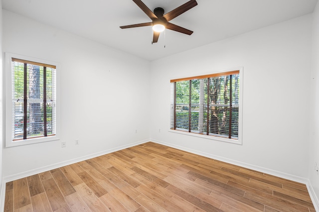 2928 Pine Valley Dr, Miramar Beach, FL 32550 - empty room featuring ceiling fan, light wood-style flooring, and a wealth of natural light
