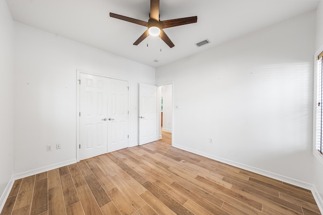 2928 Pine Valley Dr, Miramar Beach, FL 32550 - unfurnished bedroom featuring baseboards, visible vents, and light wood finished floors