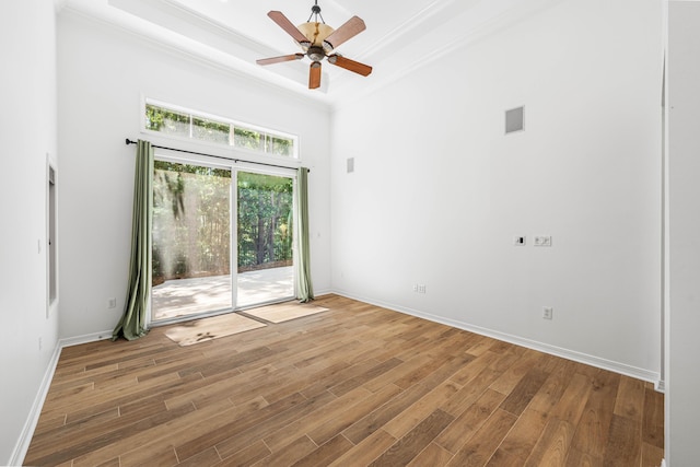 2928 Pine Valley Dr, Miramar Beach, FL 32550 - empty room with visible vents, ornamental molding, wood finished floors, baseboards, and ceiling fan
