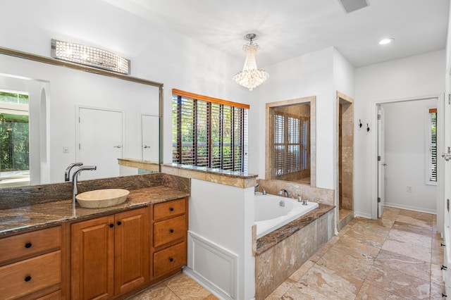 2928 Pine Valley Dr, Miramar Beach, FL 32550 - bathroom featuring a notable chandelier, a tile shower, vanity, visible vents, and a bath