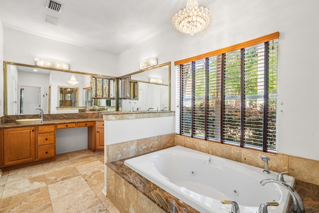 2928 Pine Valley Dr, Miramar Beach, FL 32550 - full bathroom featuring vanity, a notable chandelier, visible vents, and a jetted tub